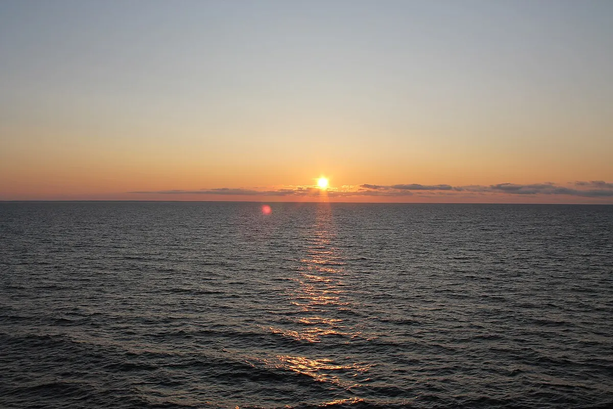 Sunset over the Baltic Sea, the sky orange near the horizon